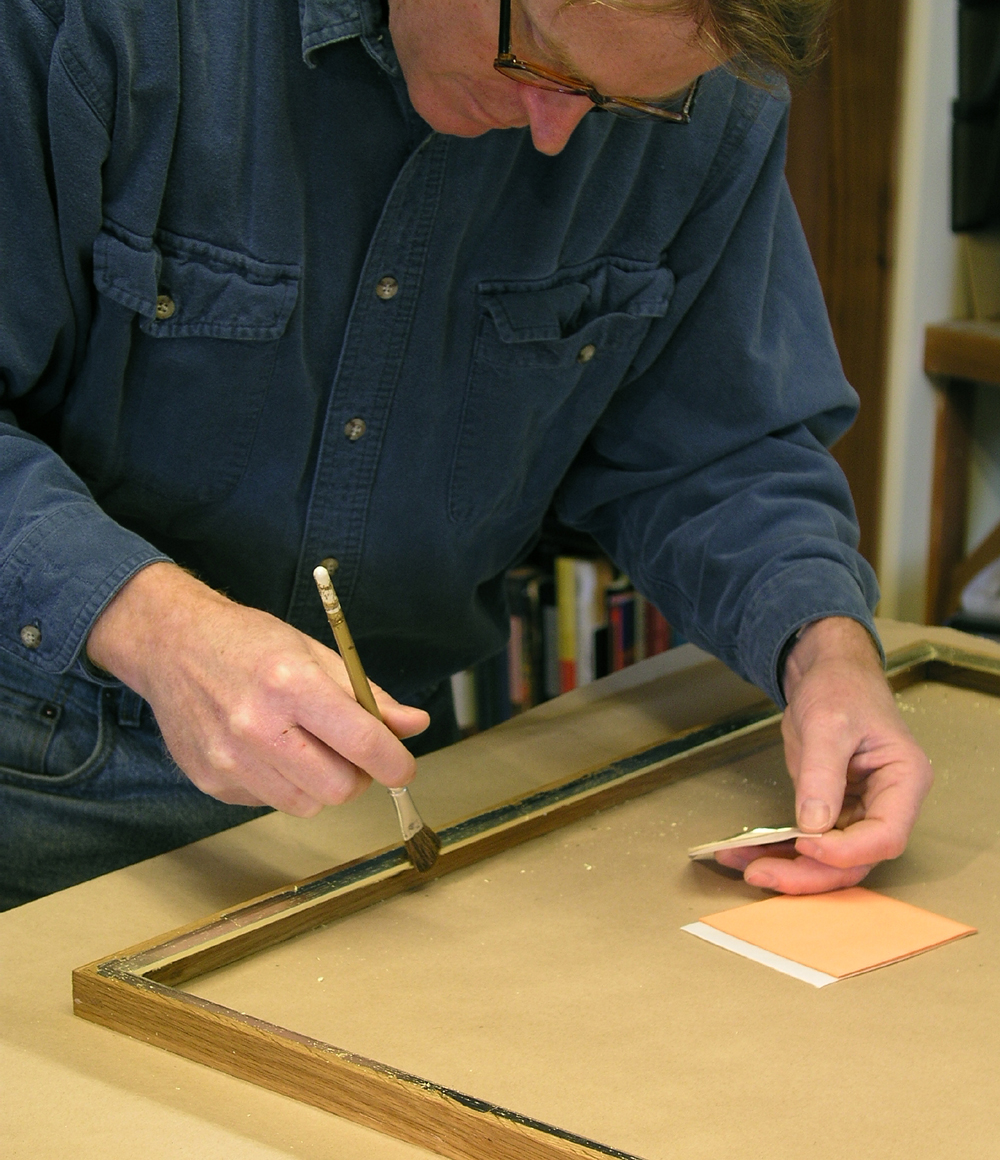 Tim Holton gilding a liner