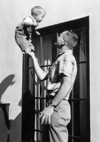 Photo of Tim as baby, with dad