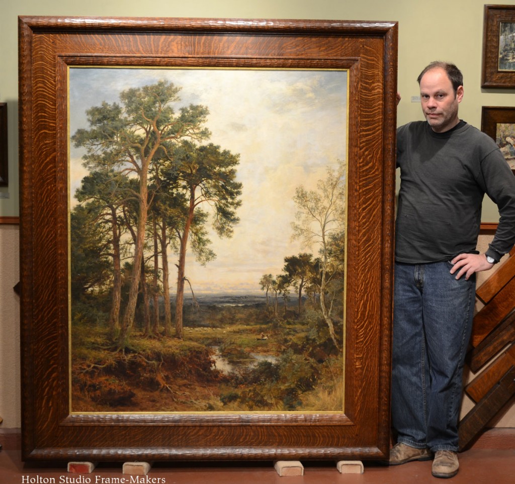 Trevor Davis shown with the painting