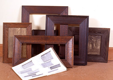 Turn of the century oak frames, with period molding manufacturer's catalog showing designs offered in quartersawn oak. 