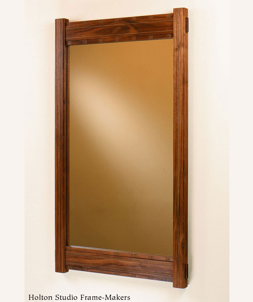 Carved and painted walnut mirror