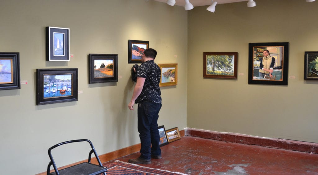 touching up gallery walls