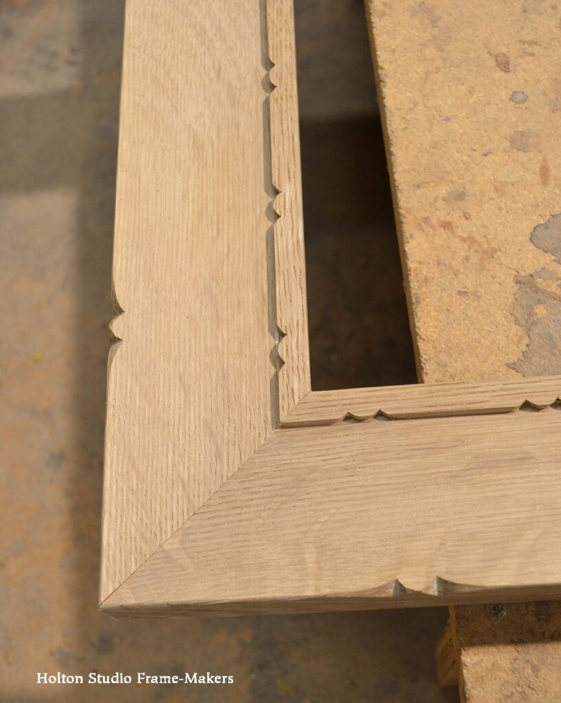 Process photo of carved oak picture frame