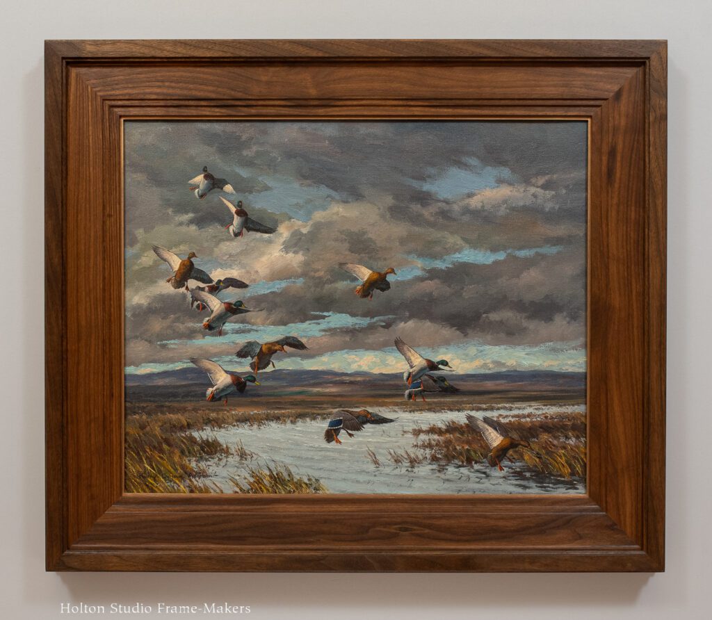 Framed Harry Adamson painting.